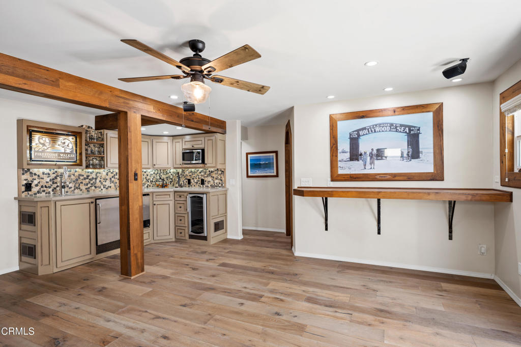 3715 Sunset Lane Oxnard, CA 93035 - Photo 30 of 45 a view of workspace with window and ceiling fan
