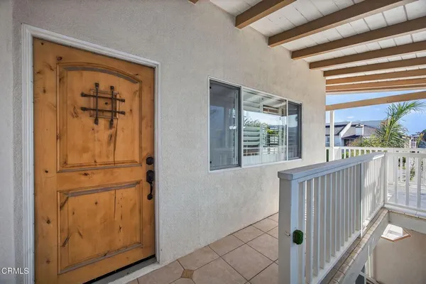 a view of entryway with a front door