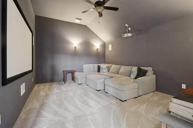 a large white bed in a white room