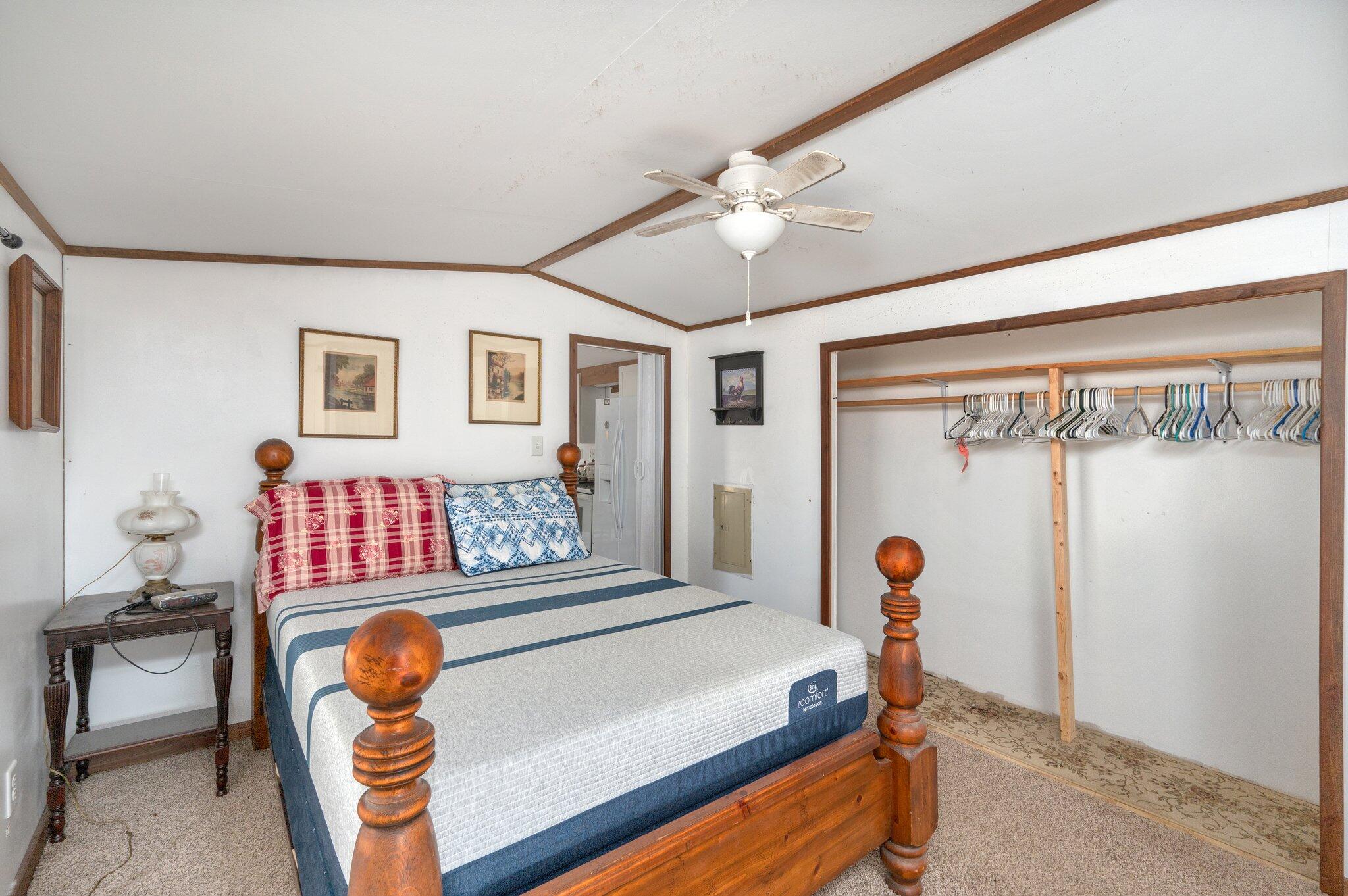 4507 Rainbird Rise Road Crestview, FL 32539 - Photo 15 of 33 a living room with furniture and a flat screen tv