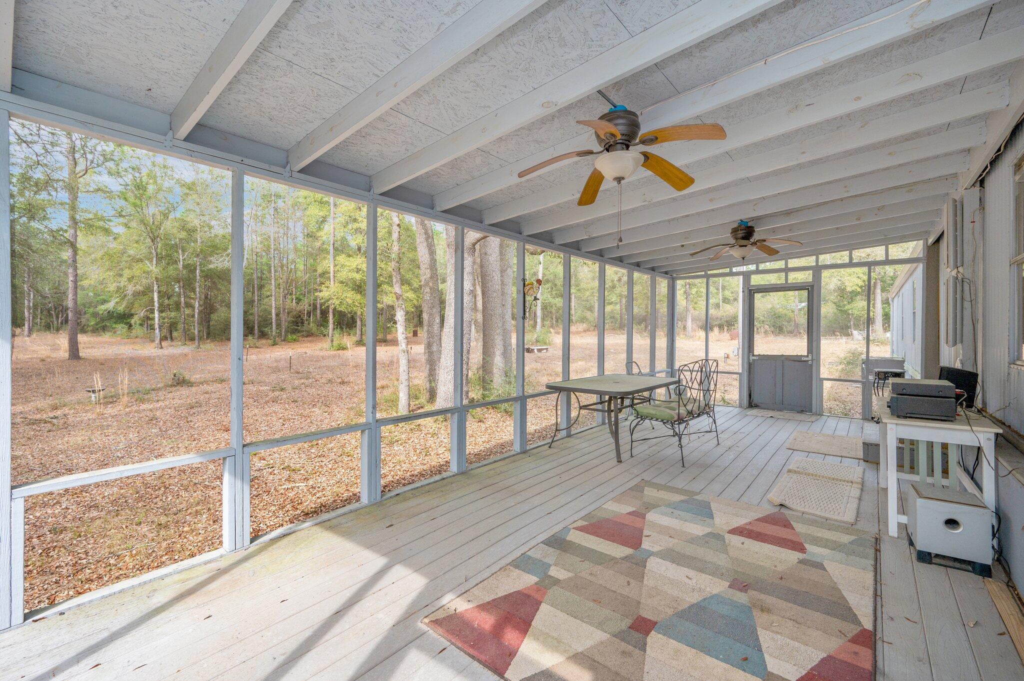 4507 Rainbird Rise Road Crestview, FL 32539 - Photo 24 of 33 a living room filled with furniture