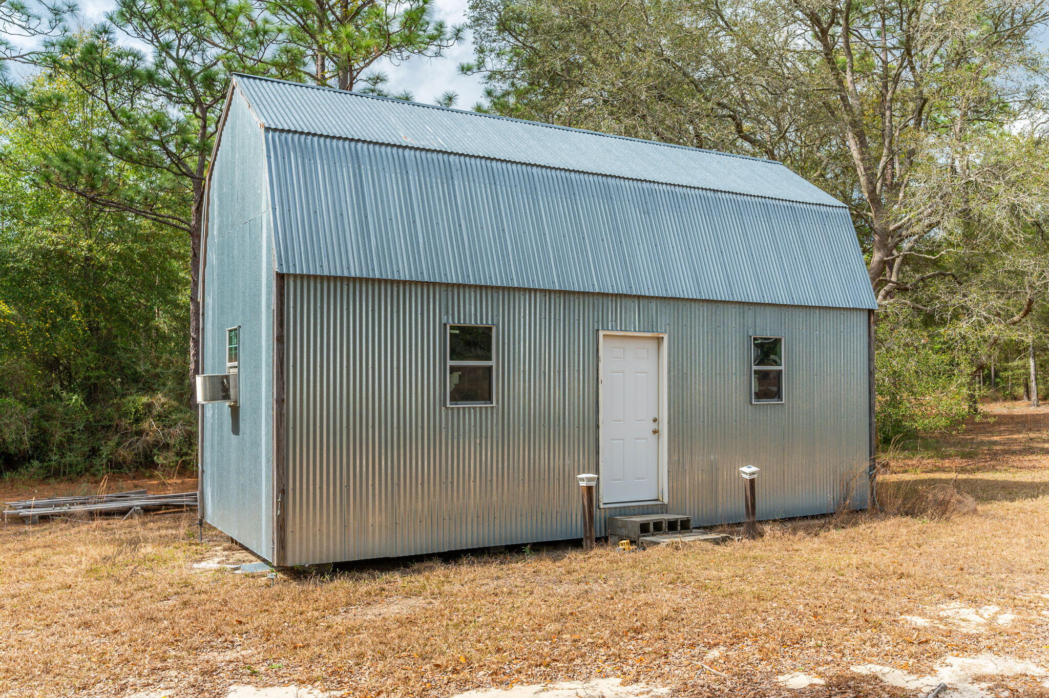 4507 Rainbird Rise Road Crestview, FL 32539 - Photo 30 of 33 a backyard of a house