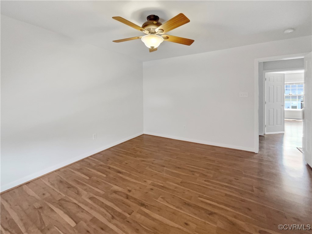 6385 Eagles Crest Lane Chesterfield, VA 23832 - Photo 15 of 24 a view of empty room with wooden floor