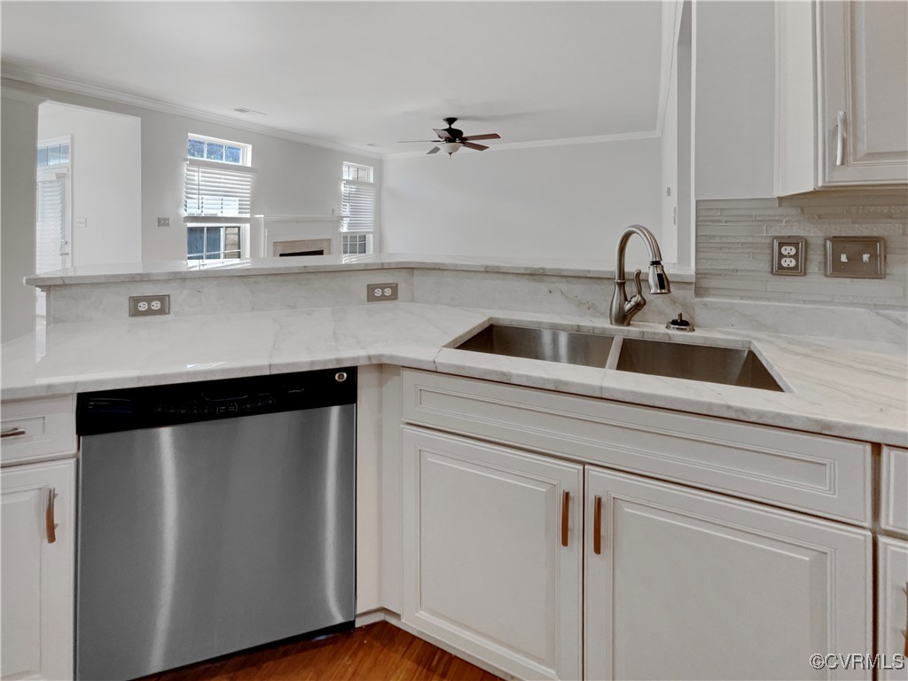 6385 Eagles Crest Lane Chesterfield, VA 23832 - Photo 17 of 24 a kitchen with white cabinets and sink