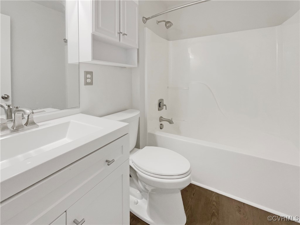 6385 Eagles Crest Lane Chesterfield, VA 23832 - Photo 18 of 24 a bathroom with a sink a toilet and shower