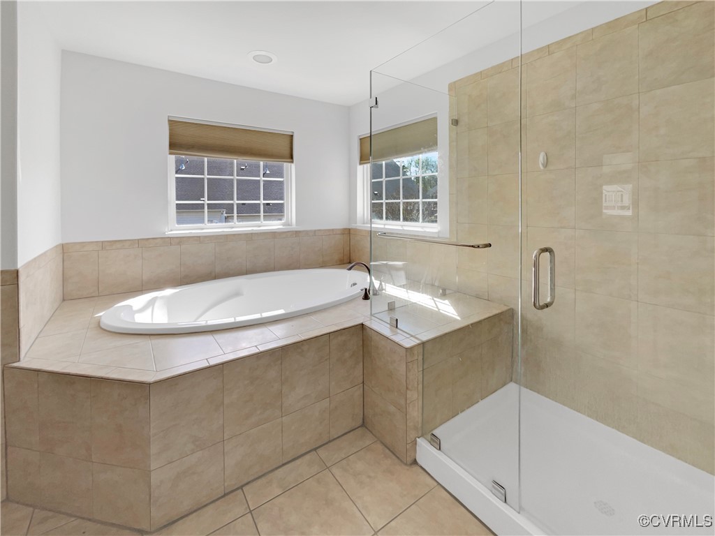 6385 Eagles Crest Lane Chesterfield, VA 23832 - Photo 7 of 24 a bathroom with a tub sink and window