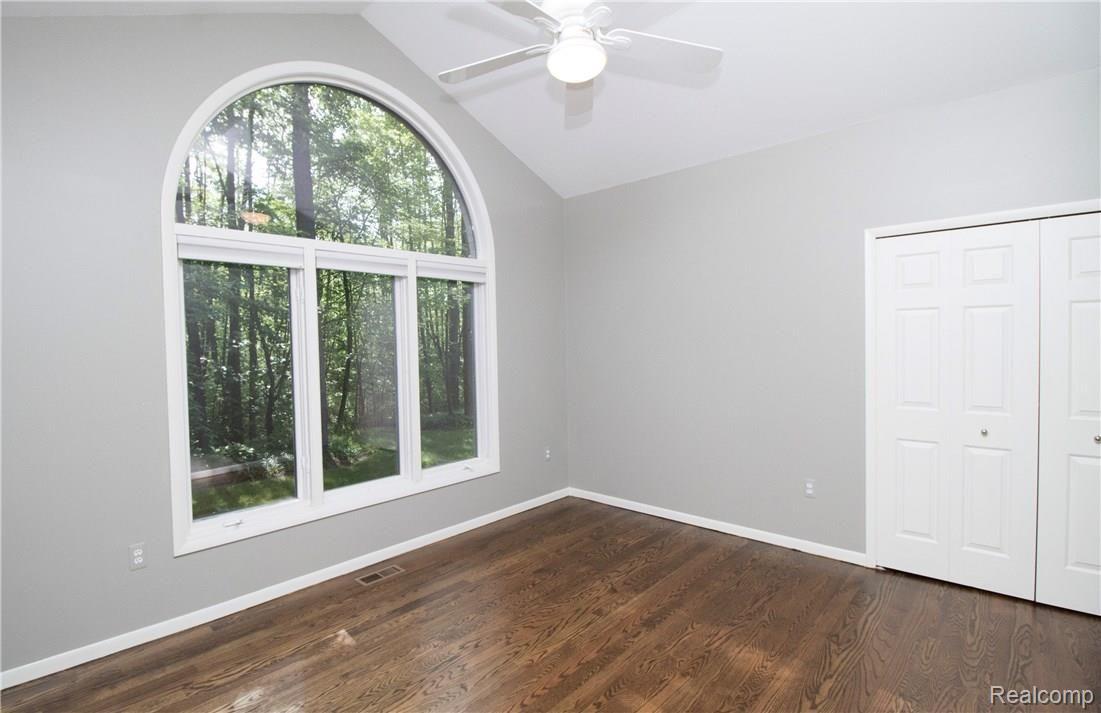 9865 Allen Road Clarkston, MI 48348 - Photo 24 of 38 Bedroom 2 with Charming Arched window