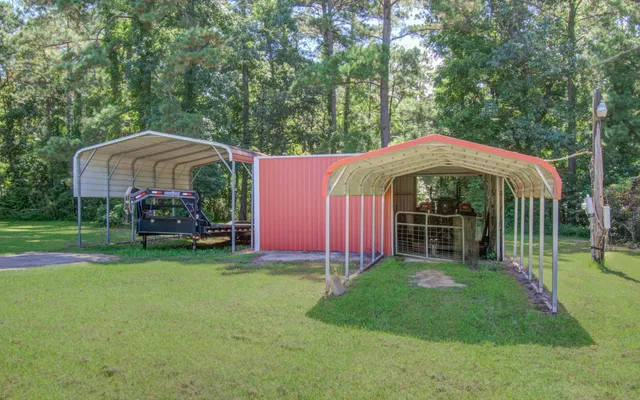 a view of a chair and table under an umbrella