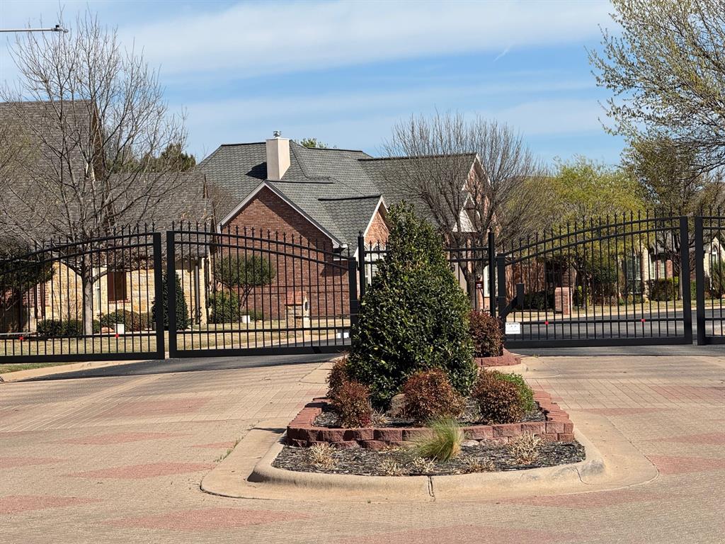 Tbd 1 B Mesa Ridge Abilene, TX 79606 - Photo 2 of 3 a view of a house with a small yard and large trees