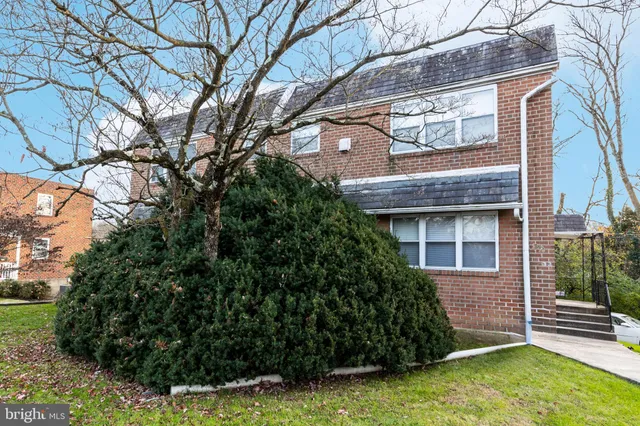 a view of a house with a garden