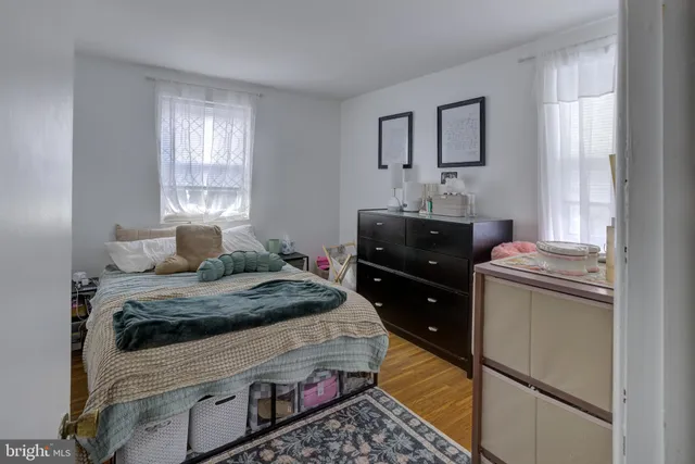 a bedroom with a bed and a closet