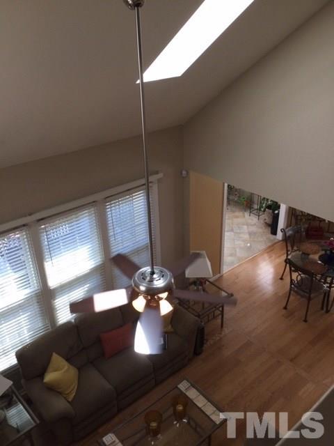 7908 Milltrace Run Raleigh, NC 27615 - Photo 14 of 20 a living room with couches chairs and a coffee table