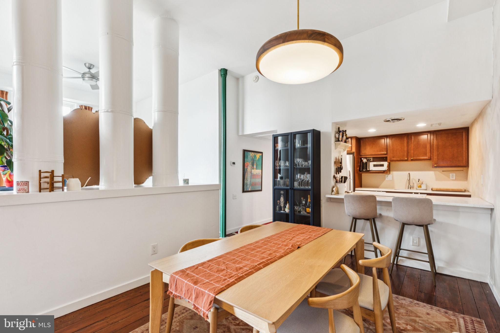 765 South 2nd Street, Unit G Philadelphia, PA 19147 - Photo 11 of 31 a kitchen with a table and chairs in it