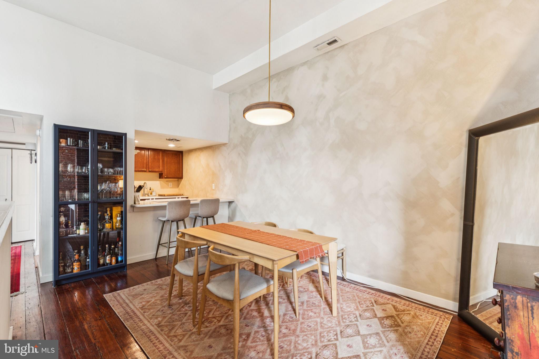 765 South 2nd Street, Unit G Philadelphia, PA 19147 - Photo 12 of 31 a dining room with a table and chairs