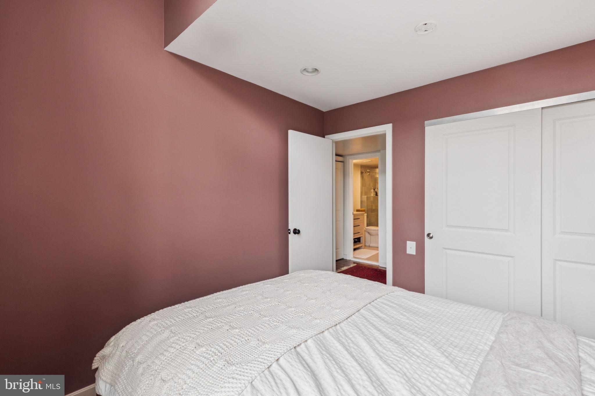 765 South 2nd Street, Unit G Philadelphia, PA 19147 - Photo 21 of 31 a bedroom with a bed and a window