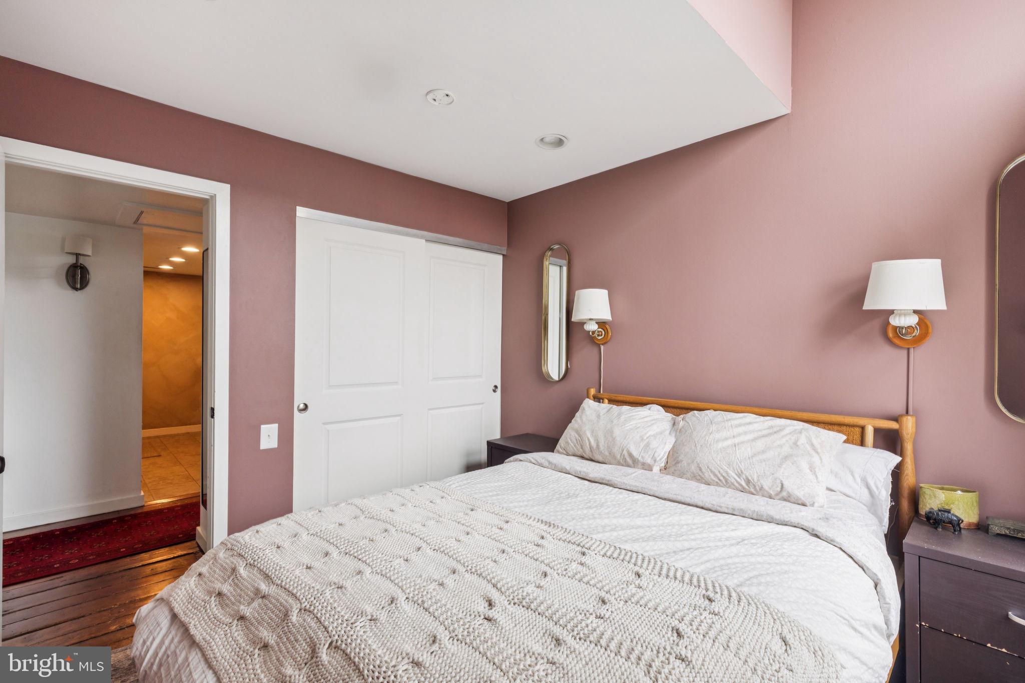 765 South 2nd Street, Unit G Philadelphia, PA 19147 - Photo 22 of 31 a bedroom with a bed and a window