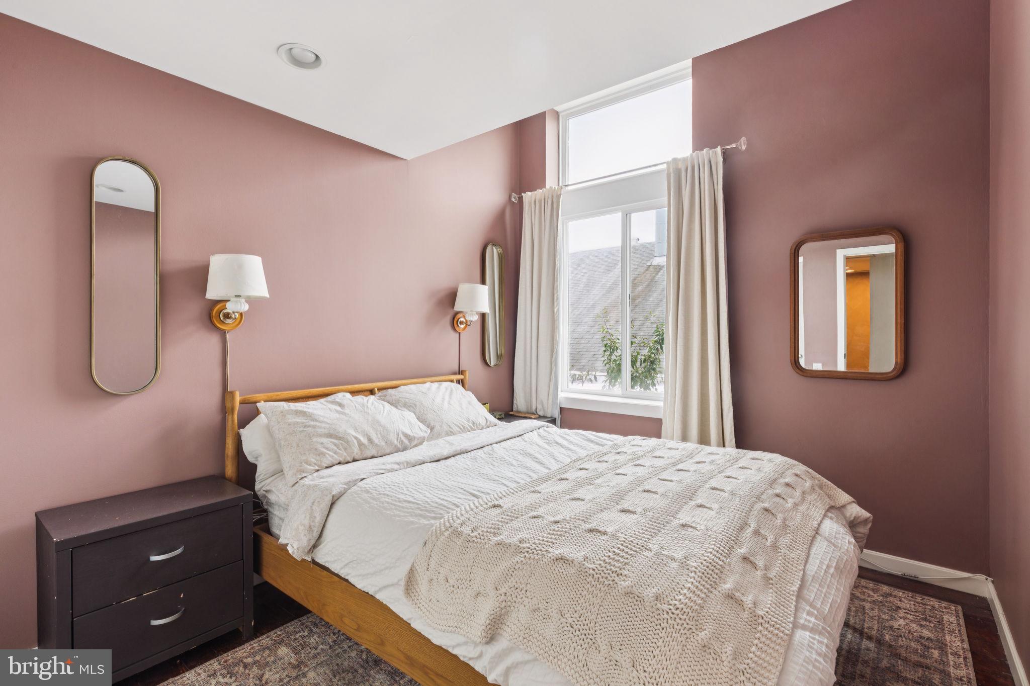 765 South 2nd Street, Unit G Philadelphia, PA 19147 - Photo 23 of 31 a bedroom with a bed and a dresser