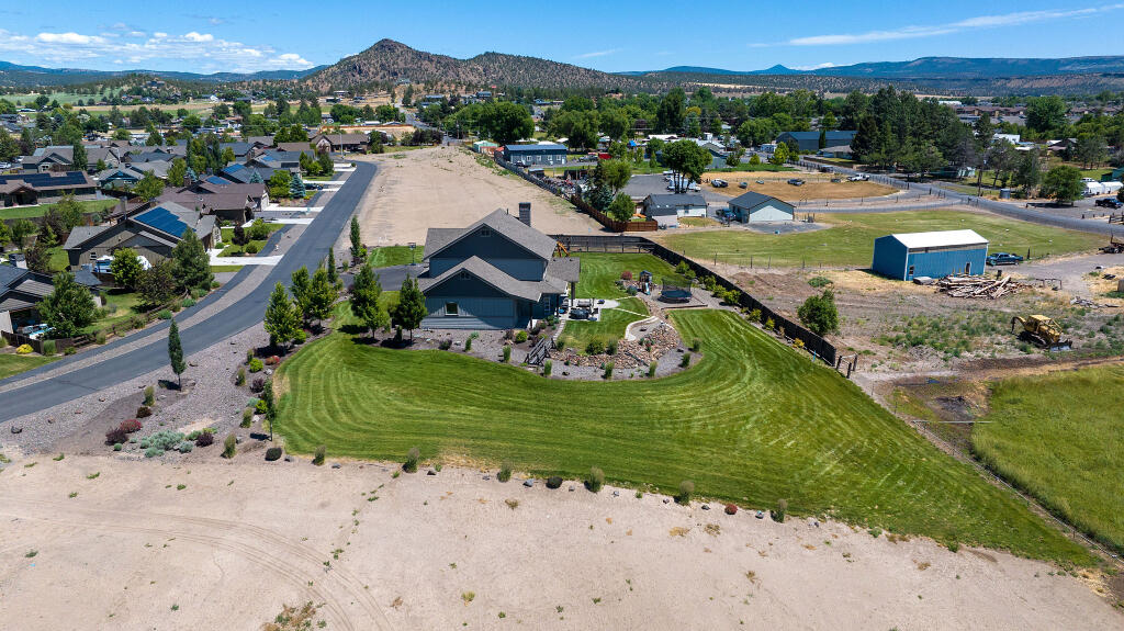 344 Northwest Saddle Ridge Loop Prineville, OR 97754 - Photo 15 of 64 a view of a city with a lake