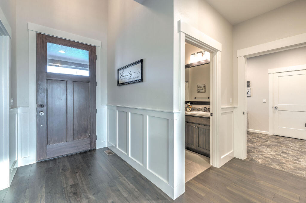 344 Northwest Saddle Ridge Loop Prineville, OR 97754 - Photo 23 of 64 a view of a kitchen with a sink and a refrigerator