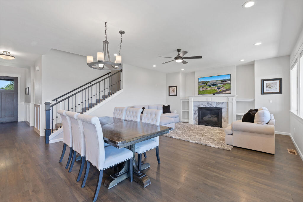344 Northwest Saddle Ridge Loop Prineville, OR 97754 - Photo 36 of 64 a living room with furniture and a fireplace