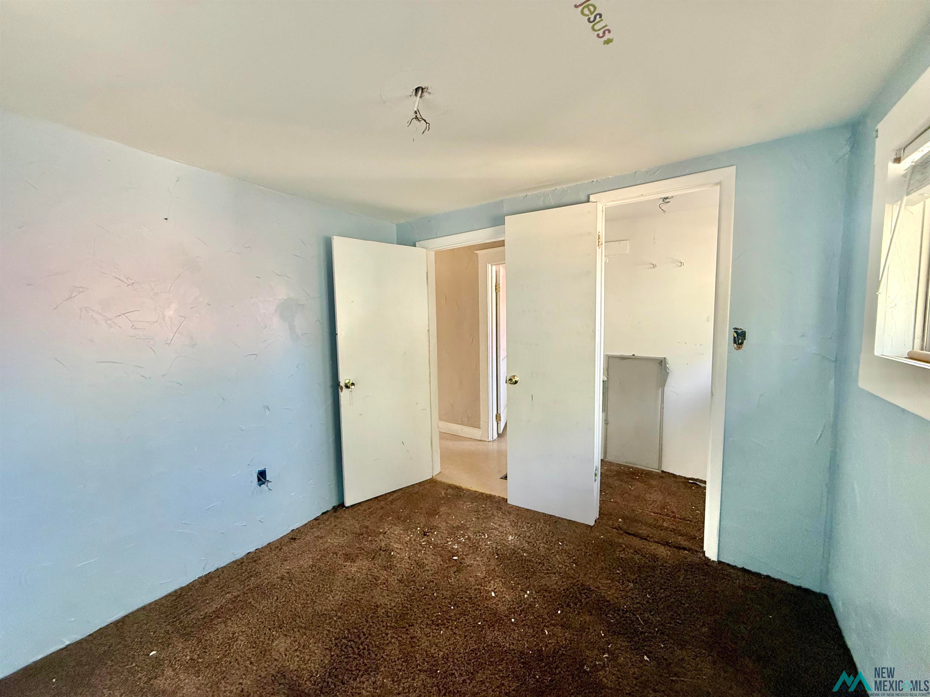 625 South 5th Street Raton, NM 87740 - Photo 4 of 45 Unfurnished bedroom with carpet floors