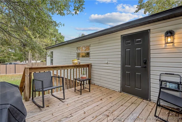 a deck view with a seating space