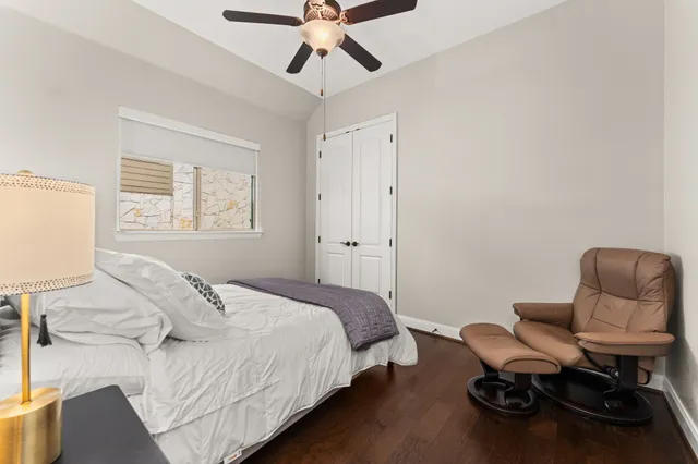 a bedroom with a workspace