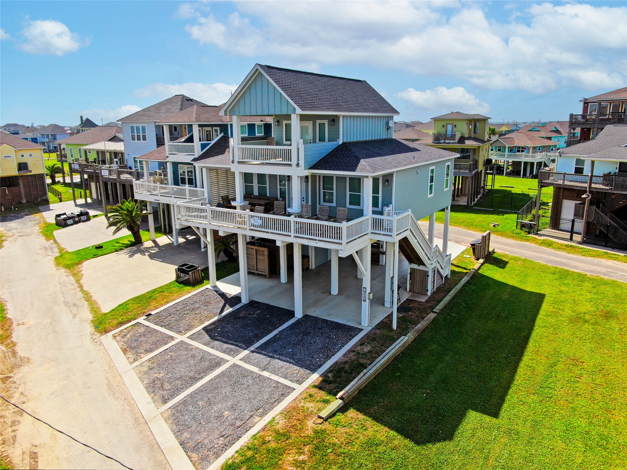 2906 Shady Lane Crystal Beach, TX 77650 - Photo 1 of 35 a view of a house with swimming pool and sitting area