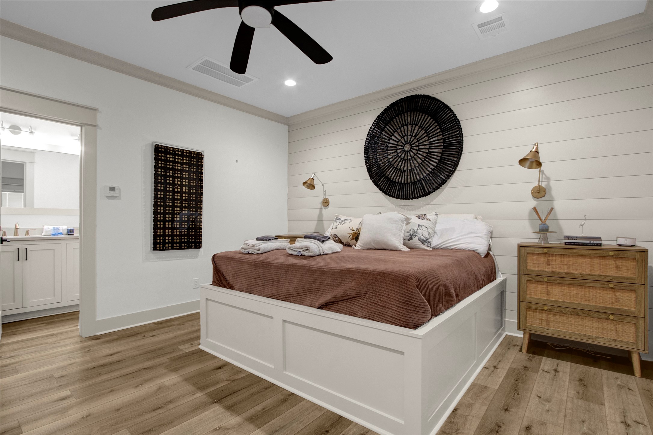2906 Shady Lane Crystal Beach, TX 77650 - Photo 12 of 35 a bedroom with a bed and a table