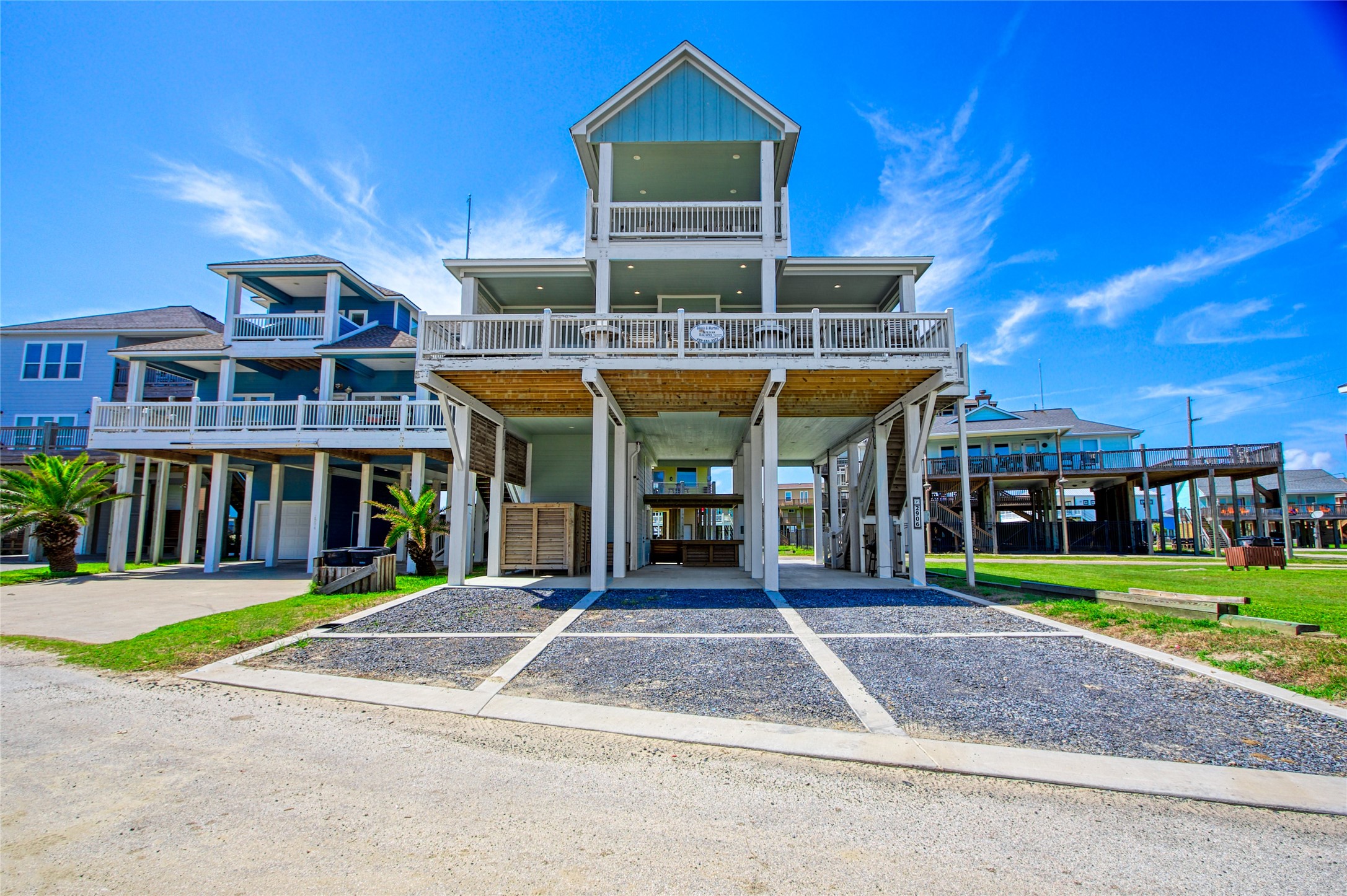 2906 Shady Lane Crystal Beach, TX 77650 - Photo 2 of 35 a view of a building with a patio
