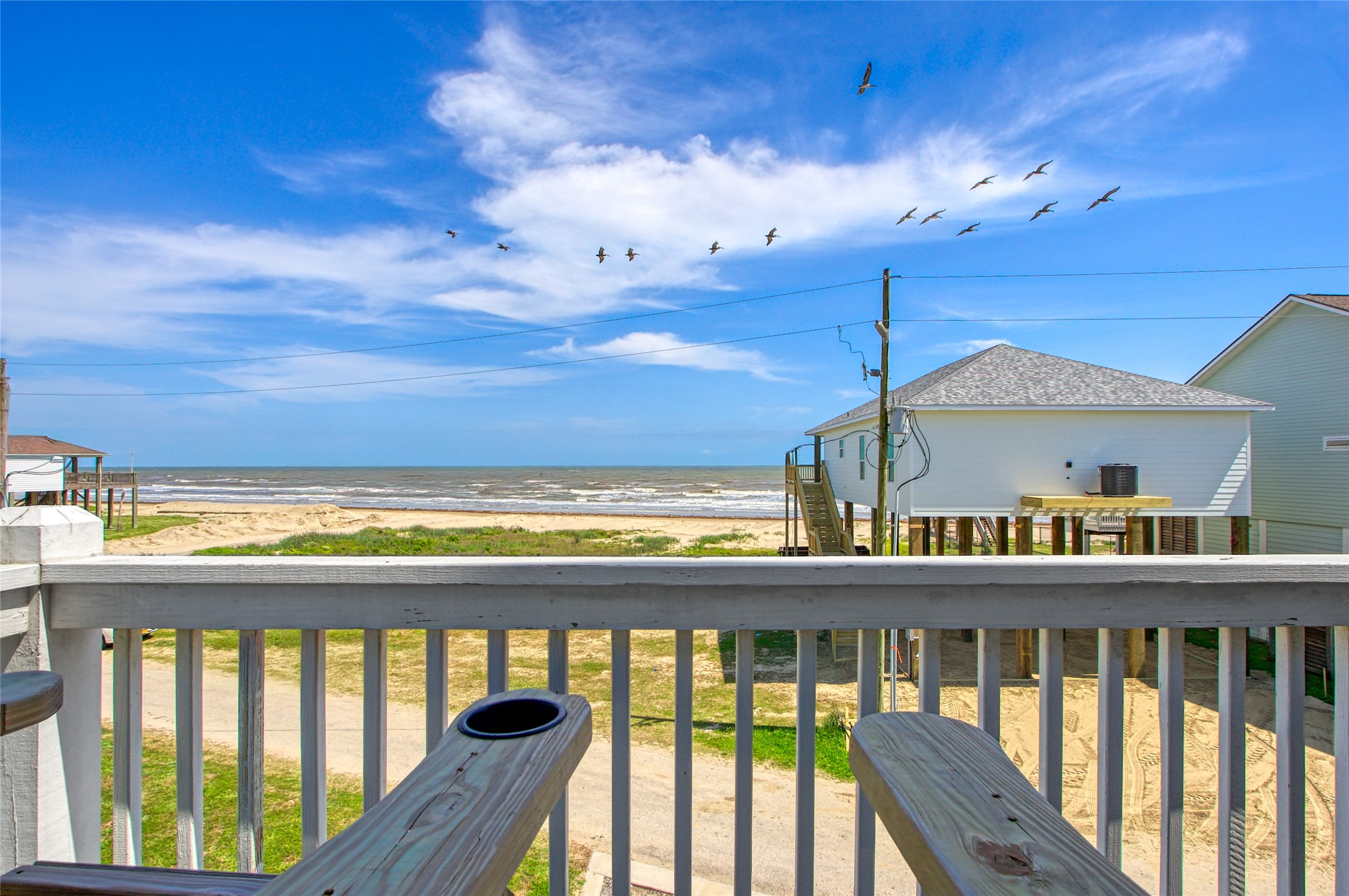 2906 Shady Lane Crystal Beach, TX 77650 - Photo 26 of 35 a view of a city from a balcony