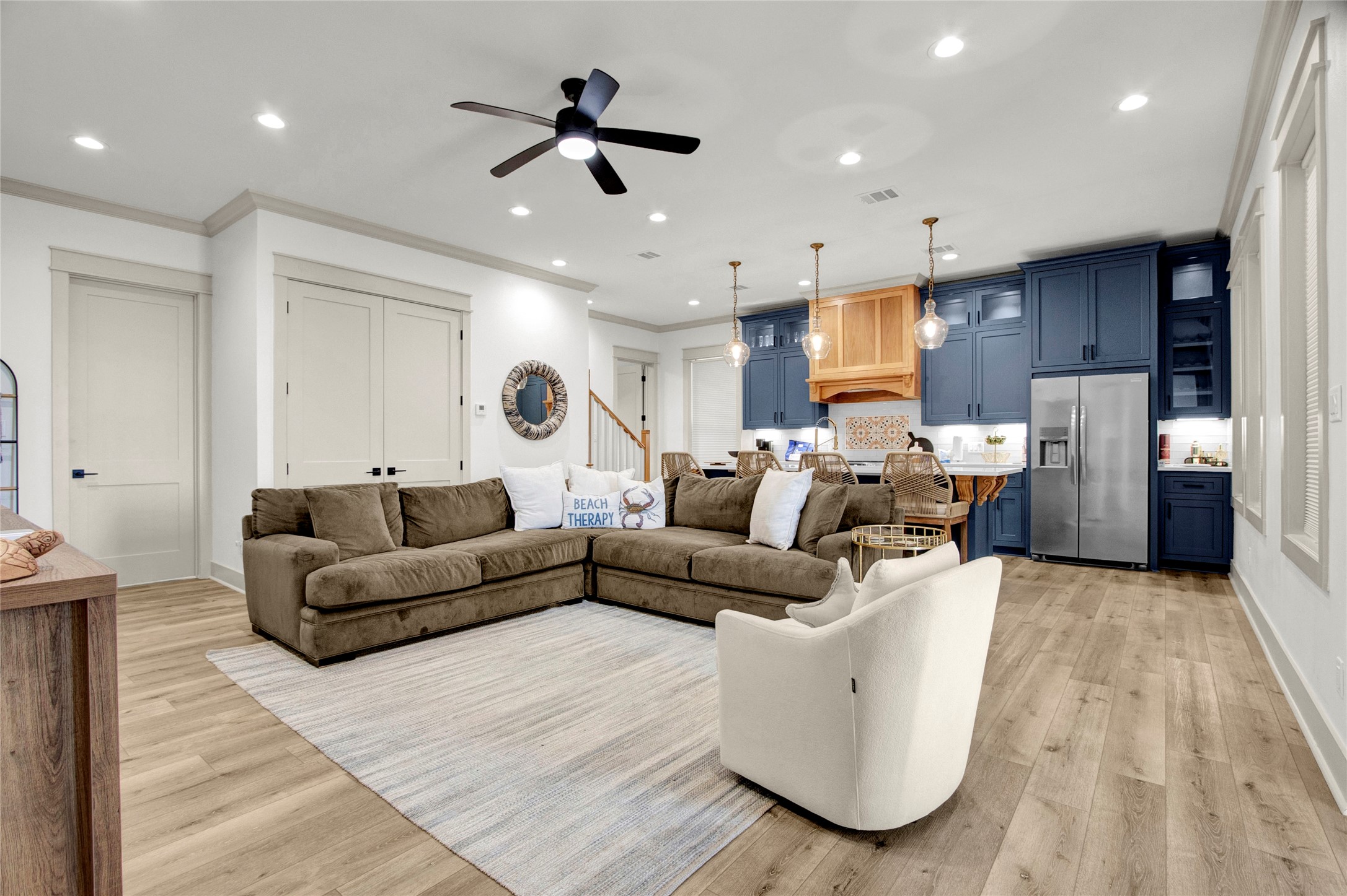 2906 Shady Lane Crystal Beach, TX 77650 - Photo 33 of 35 a living room with furniture and a chandelier