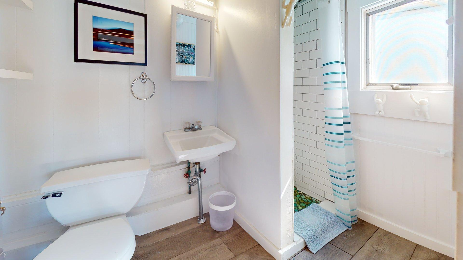 168 Shore Road, Unit 9 Truro, MA 02666 - Photo 25 of 33 a bathroom with a toilet and a shower