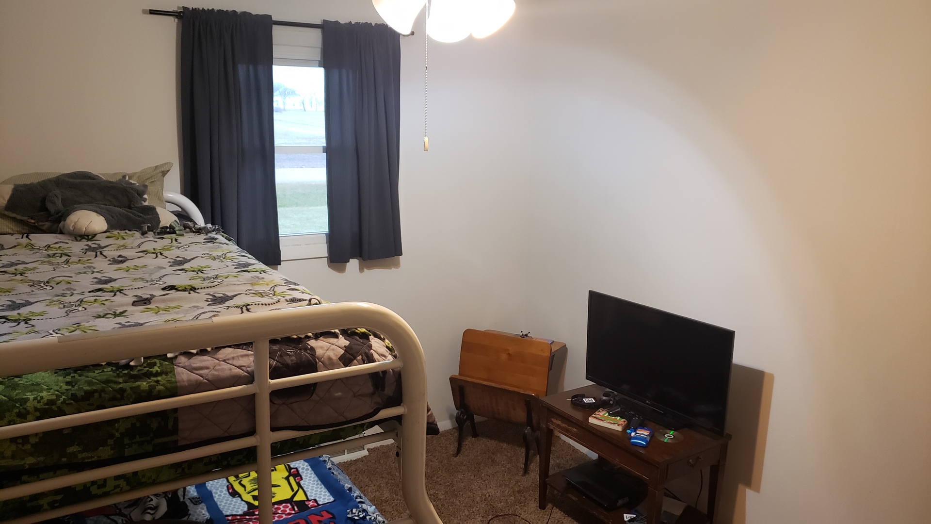 28915 Bell Road Rock Falls, IL 61071 - Photo 11 of 16 a bedroom with a bed and wooden floor
