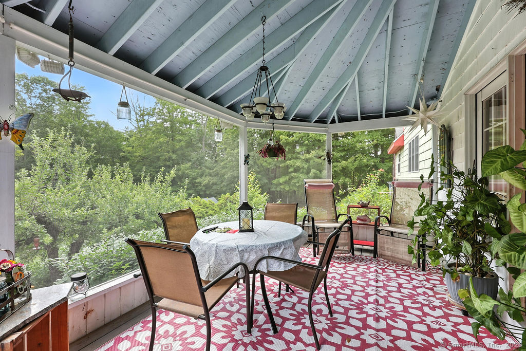 186 Mill Street Hartland, CT 06091 - Photo 23 of 33 a outdoor dining space with furniture and outdoor view