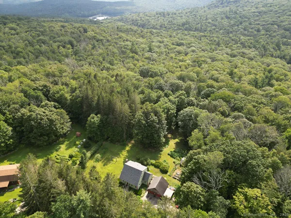 an aerial view of residential house with outdoor space