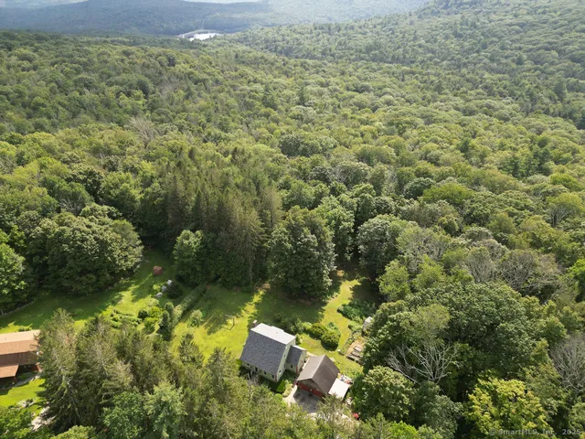 an aerial view of residential house with outdoor space