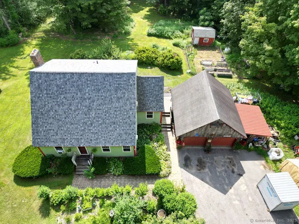 an aerial view of a house with garden