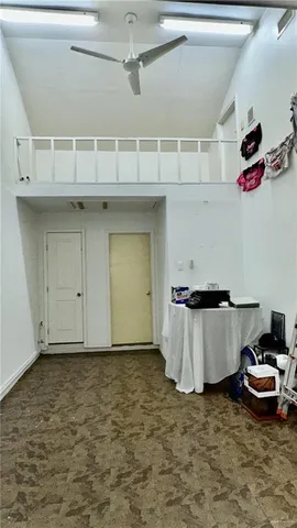 a room with a stove and cabinets