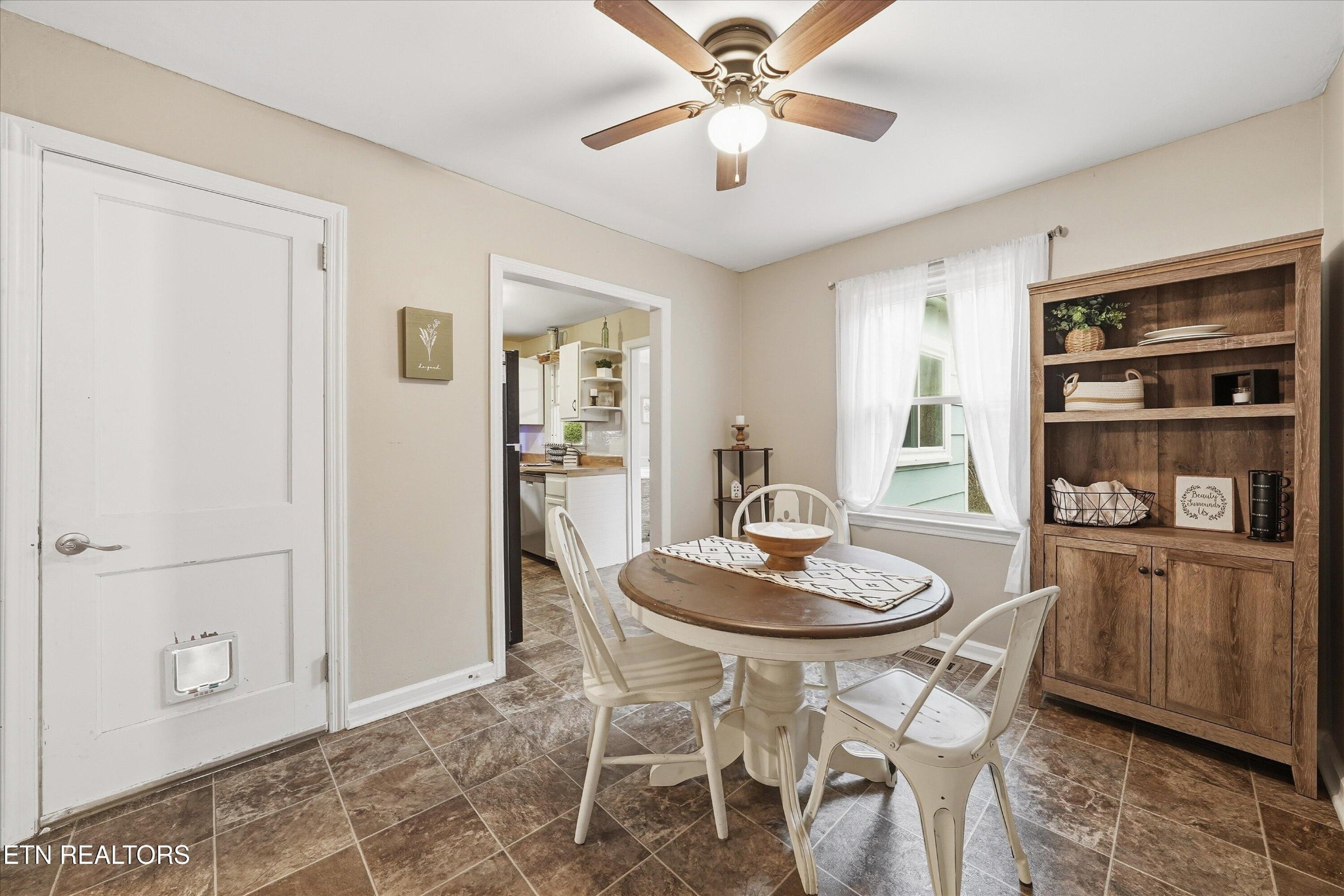 119 Old State Circle Powell, TN 37849 - Photo 13 of 27 a dining room with furniture and window
