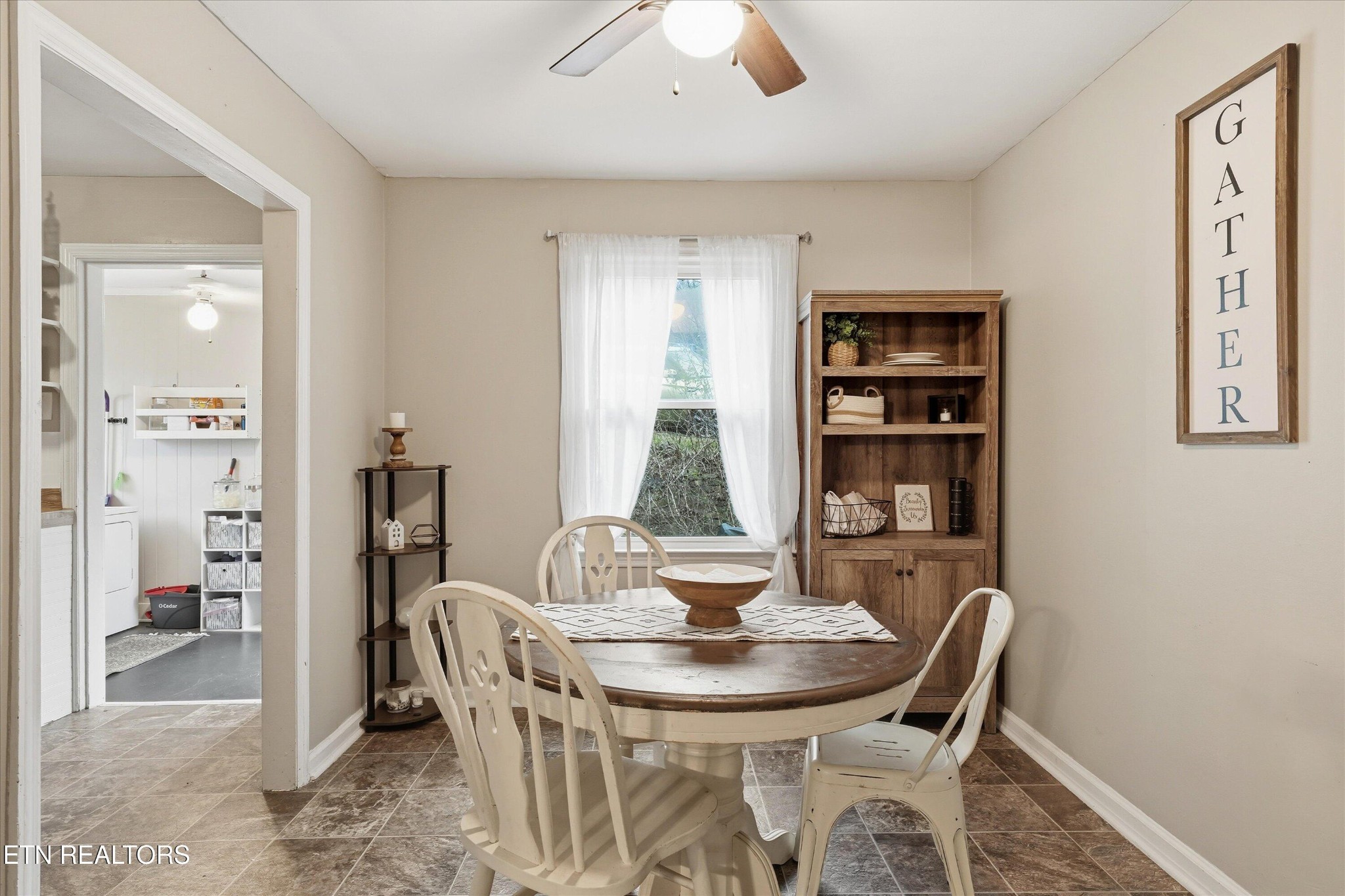 119 Old State Circle Powell, TN 37849 - Photo 14 of 27 a view of a dining room with furniture window and wooden floor