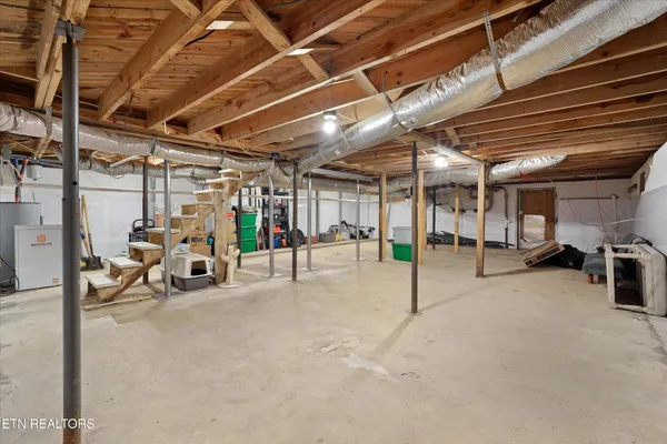 a view of parking garage with cars