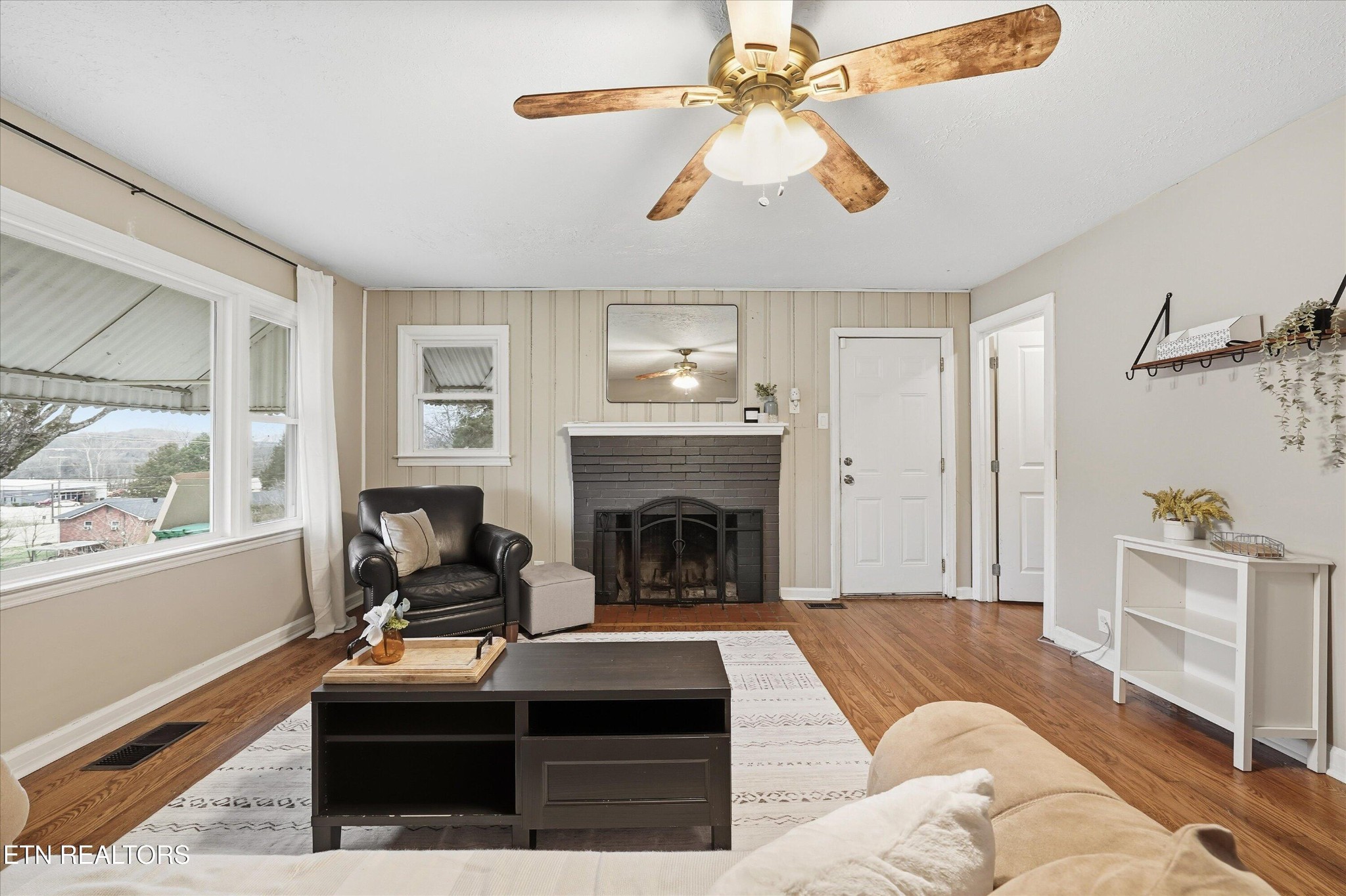 119 Old State Circle Powell, TN 37849 - Photo 6 of 27 a living room with furniture and a fireplace