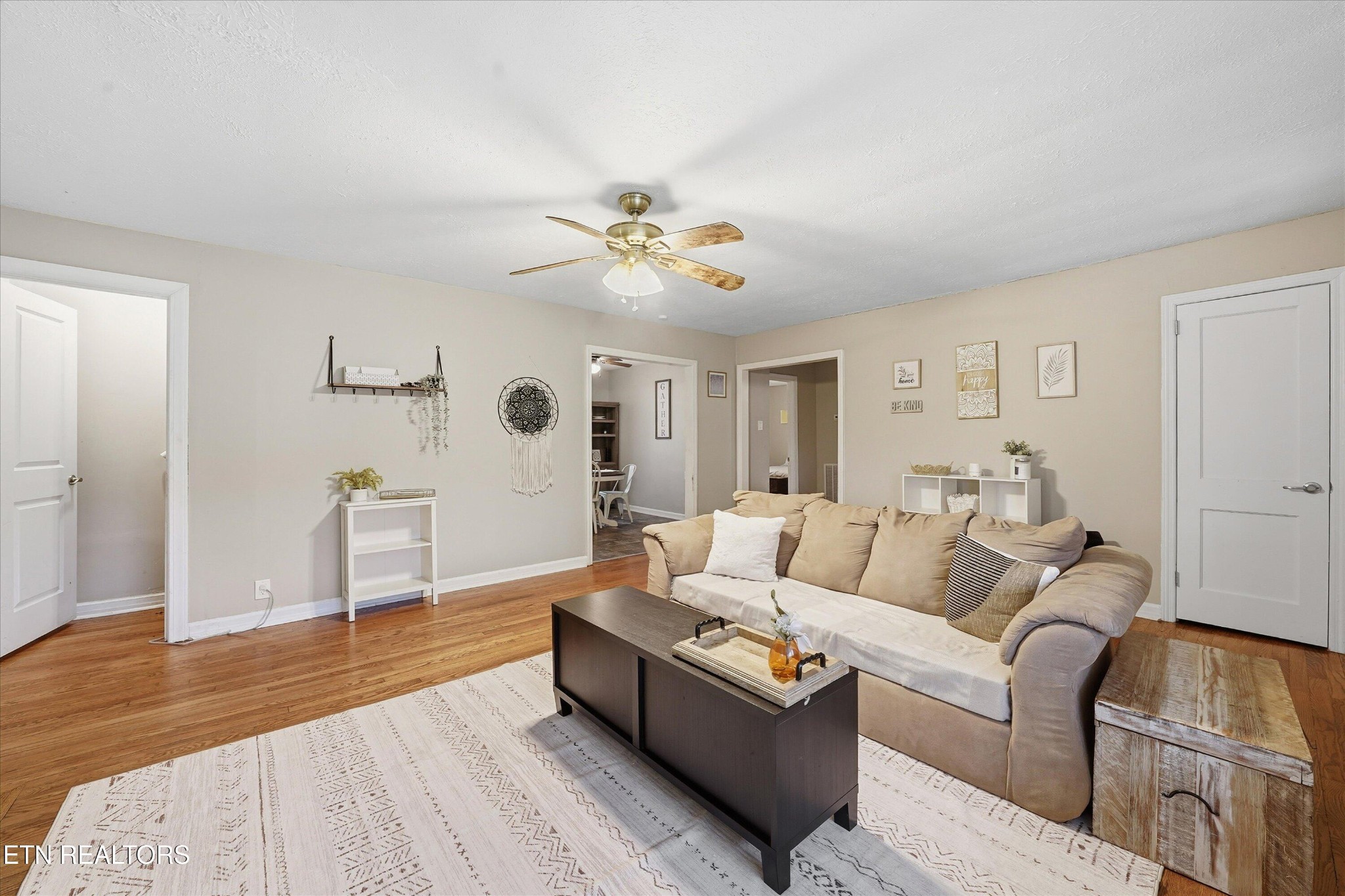 119 Old State Circle Powell, TN 37849 - Photo 8 of 27 a living room with furniture and a wooden floor