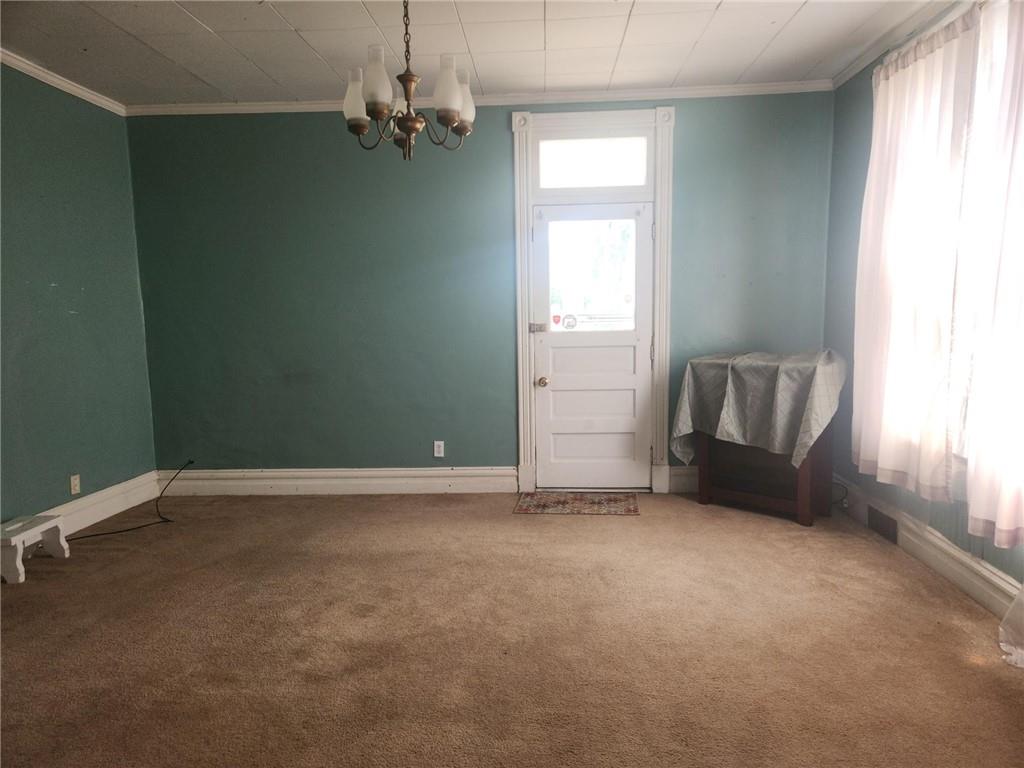 307 North 3rd Street Apollo, PA 15613 - Photo 5 of 17 an empty room with windows