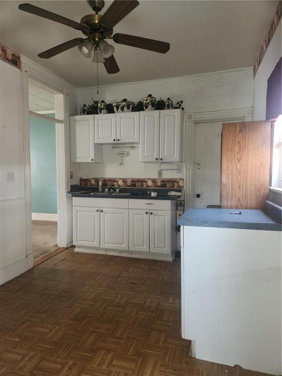 307 North 3rd Street Apollo, PA 15613 - Photo 7 of 17 a kitchen with kitchen island granite countertop a sink cabinets and stainless steel appliances