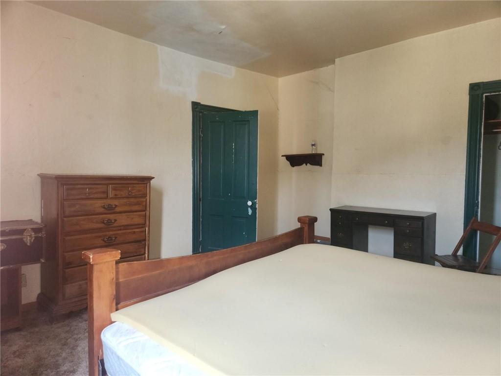 307 North 3rd Street Apollo, PA 15613 - Photo 9 of 17 a bedroom with a bed and wooden floor