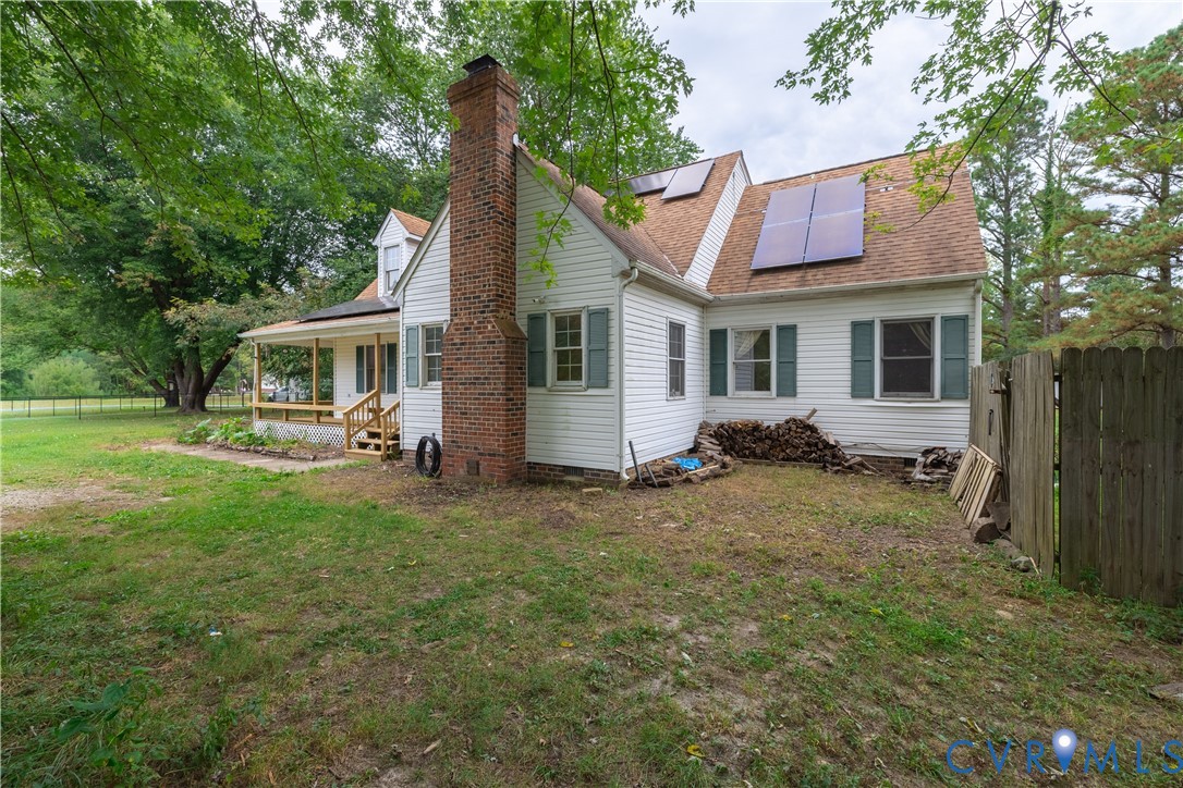 2500 Meadow Road Sandston, VA 23150 - Photo 3 of 50 Back of house with roof mounted solar panels, a sh