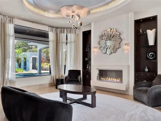 a kitchen with stainless steel appliances granite countertop a sink and stove