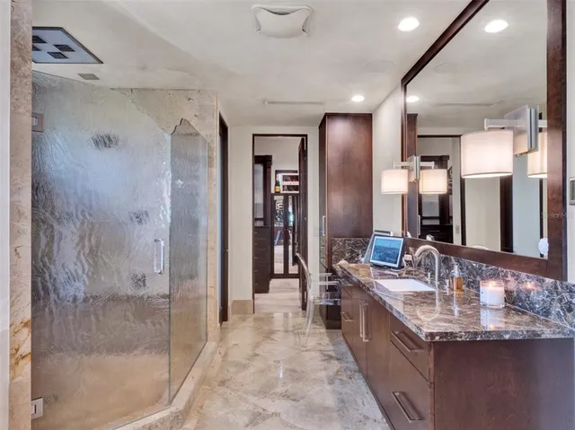 a view of a hallway with a painting on the wall